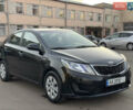 Черный Киа Рио, объемом двигателя 1.4 л и пробегом 305 тыс. км за 4950 $, фото 3 на Automoto.ua