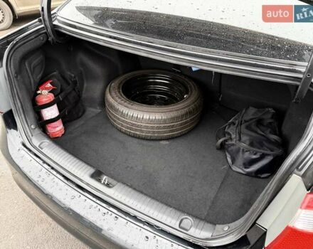 Черный Киа Рио, объемом двигателя 1.4 л и пробегом 220 тыс. км за 8200 $, фото 26 на Automoto.ua