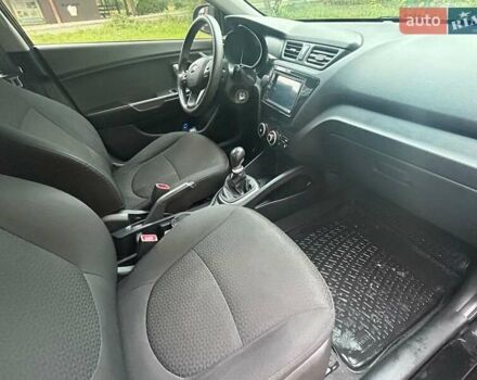 Чорний Кіа Ріо, об'ємом двигуна 1.4 л та пробігом 141 тис. км за 7200 $, фото 12 на Automoto.ua