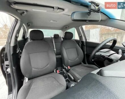 Черный Киа Рио, объемом двигателя 1.4 л и пробегом 124 тыс. км за 9350 $, фото 67 на Automoto.ua