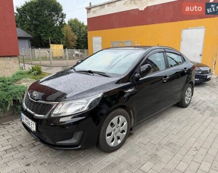 Чорний Кіа Ріо, об'ємом двигуна 1.4 л та пробігом 87 тис. км за 7700 $, фото 2 на Automoto.ua