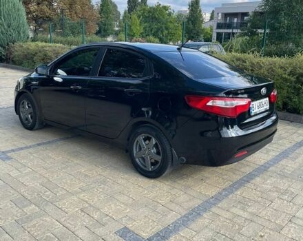 Черный Киа Рио, объемом двигателя 1.4 л и пробегом 247 тыс. км за 7800 $, фото 1 на Automoto.ua