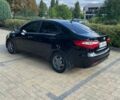 Черный Киа Рио, объемом двигателя 1.4 л и пробегом 247 тыс. км за 7800 $, фото 1 на Automoto.ua