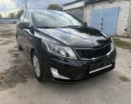 Чорний Кіа Ріо, об'ємом двигуна 1.6 л та пробігом 61 тис. км за 10351 $, фото 2 на Automoto.ua