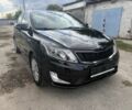 Чорний Кіа Ріо, об'ємом двигуна 1.6 л та пробігом 61 тис. км за 10351 $, фото 2 на Automoto.ua