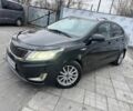 Чорний Кіа Ріо, об'ємом двигуна 1.4 л та пробігом 214 тис. км за 7700 $, фото 1 на Automoto.ua