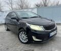 Черный Киа Рио, объемом двигателя 1.4 л и пробегом 214 тыс. км за 7700 $, фото 1 на Automoto.ua