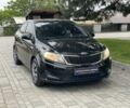 Чорний Кіа Ріо, об'ємом двигуна 1.4 л та пробігом 195 тис. км за 6500 $, фото 1 на Automoto.ua