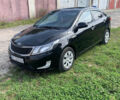 Черный Киа Рио, объемом двигателя 1.4 л и пробегом 212 тыс. км за 7800 $, фото 1 на Automoto.ua