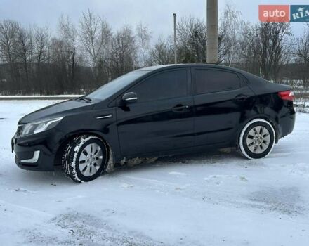 Черный Киа Рио, объемом двигателя 1.59 л и пробегом 107 тыс. км за 7950 $, фото 2 на Automoto.ua