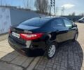 Чорний Кіа Ріо, об'ємом двигуна 1.4 л та пробігом 214 тис. км за 7700 $, фото 3 на Automoto.ua