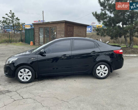 Черный Киа Рио, объемом двигателя 1.4 л и пробегом 136 тыс. км за 7700 $, фото 6 на Automoto.ua