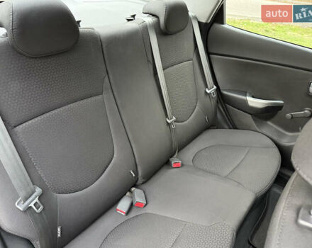 Чорний Кіа Ріо, об'ємом двигуна 1.4 л та пробігом 45 тис. км за 9800 $, фото 26 на Automoto.ua