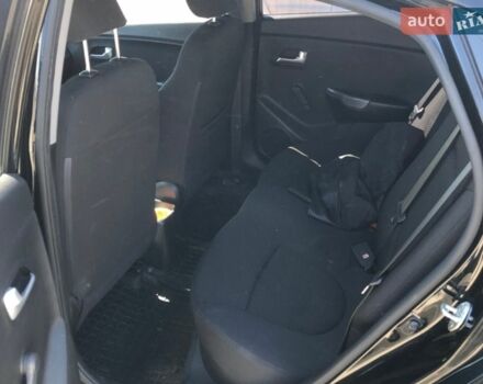 Чорний Кіа Ріо, об'ємом двигуна 1.4 л та пробігом 177 тис. км за 6800 $, фото 9 на Automoto.ua