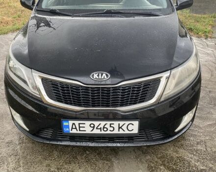 Чорний Кіа Ріо, об'ємом двигуна 1.4 л та пробігом 88 тис. км за 8300 $, фото 1 на Automoto.ua