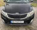 Чорний Кіа Ріо, об'ємом двигуна 1.4 л та пробігом 88 тис. км за 8300 $, фото 1 на Automoto.ua
