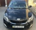 Чорний Кіа Ріо, об'ємом двигуна 1.6 л та пробігом 128 тис. км за 8500 $, фото 1 на Automoto.ua
