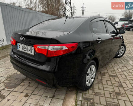 Черный Киа Рио, объемом двигателя 1.4 л и пробегом 185 тыс. км за 6999 $, фото 3 на Automoto.ua