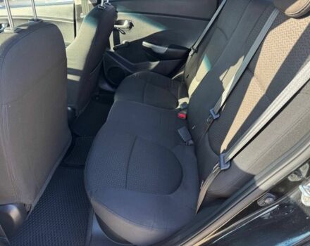 Чорний Кіа Ріо, об'ємом двигуна 1.4 л та пробігом 214 тис. км за 7700 $, фото 13 на Automoto.ua