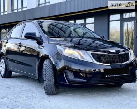 Чорний Кіа Ріо, об'ємом двигуна 1.4 л та пробігом 160 тис. км за 7800 $, фото 1 на Automoto.ua