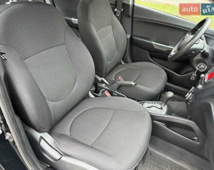 Чорний Кіа Ріо, об'ємом двигуна 1.4 л та пробігом 45 тис. км за 9800 $, фото 22 на Automoto.ua