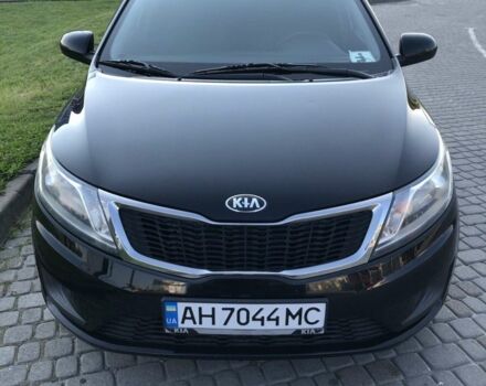 Чорний Кіа Ріо, об'ємом двигуна 1.4 л та пробігом 92 тис. км за 10000 $, фото 1 на Automoto.ua