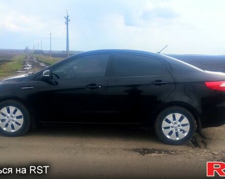 Чорний Кіа Ріо, об'ємом двигуна 1.6 л та пробігом 91 тис. км за 7800 $, фото 3 на Automoto.ua