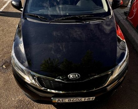 Чорний Кіа Ріо, об'ємом двигуна 1.4 л та пробігом 73 тис. км за 9000 $, фото 6 на Automoto.ua