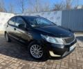Черный Киа Рио, объемом двигателя 1.4 л и пробегом 214 тыс. км за 7700 $, фото 1 на Automoto.ua