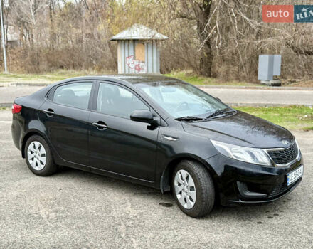 Чорний Кіа Ріо, об'ємом двигуна 1.4 л та пробігом 45 тис. км за 9800 $, фото 4 на Automoto.ua