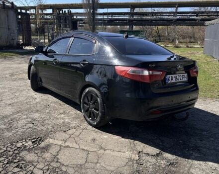 Чорний Кіа Ріо, об'ємом двигуна 1.6 л та пробігом 329 тис. км за 6000 $, фото 5 на Automoto.ua