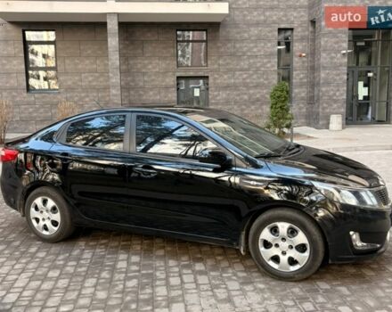 Чорний Кіа Ріо, об'ємом двигуна 1.6 л та пробігом 272 тис. км за 5950 $, фото 5 на Automoto.ua