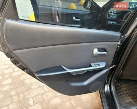 Чорний Кіа Ріо, об'ємом двигуна 1.6 л та пробігом 272 тис. км за 5950 $, фото 13 на Automoto.ua