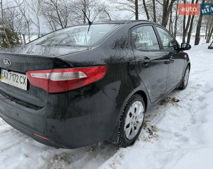 Чорний Кіа Ріо, об'ємом двигуна 1.4 л та пробігом 123 тис. км за 7300 $, фото 5 на Automoto.ua