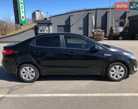 Чорний Кіа Ріо, об'ємом двигуна 1.4 л та пробігом 177 тис. км за 6800 $, фото 5 на Automoto.ua