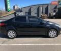Чорний Кіа Ріо, об'ємом двигуна 1.4 л та пробігом 177 тис. км за 6800 $, фото 5 на Automoto.ua