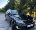Чорний Кіа Ріо, об'ємом двигуна 1.4 л та пробігом 179 тис. км за 8000 $, фото 2 на Automoto.ua