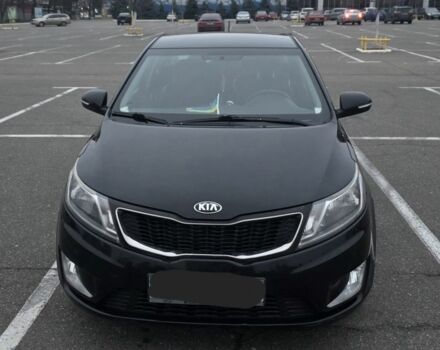 Черный Киа Рио, объемом двигателя 1.6 л и пробегом 150 тыс. км за 9000 $, фото 1 на Automoto.ua