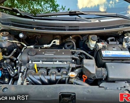 Киа Рио 2013 в Ромнах на Automoto.ua Черный Киа Рио, объемом двигателя 1.6 л и пробегом 130 тыс. км за 8750 $, фото 5 на Automoto.ua