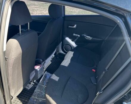 Черный Киа Рио, объемом двигателя 1.4 л и пробегом 200 тыс. км за 6500 $, фото 6 на Automoto.ua