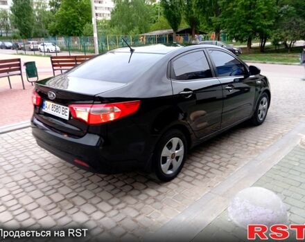 Черный Киа Рио, объемом двигателя 1.4 л и пробегом 168 тыс. км за 7600 $, фото 3 на Automoto.ua