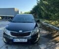 Чорний Кіа Ріо, об'ємом двигуна 1.4 л та пробігом 179 тис. км за 8000 $, фото 6 на Automoto.ua