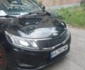 Черный Киа Рио, объемом двигателя 1.4 л и пробегом 320 тыс. км за 6200 $, фото 1 на Automoto.ua