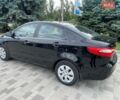 Черный Киа Рио, объемом двигателя 1.4 л и пробегом 89 тыс. км за 8300 $, фото 2 на Automoto.ua