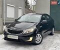 Черный Киа Рио, объемом двигателя 1.4 л и пробегом 124 тыс. км за 9350 $, фото 18 на Automoto.ua