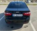 Черный Киа Рио, объемом двигателя 1.4 л и пробегом 139 тыс. км за 9500 $, фото 2 на Automoto.ua