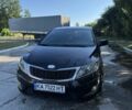 Черный Киа Рио, объемом двигателя 1.4 л и пробегом 179 тыс. км за 7998 $, фото 1 на Automoto.ua
