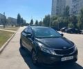 Черный Киа Рио, объемом двигателя 1.4 л и пробегом 200 тыс. км за 6500 $, фото 1 на Automoto.ua