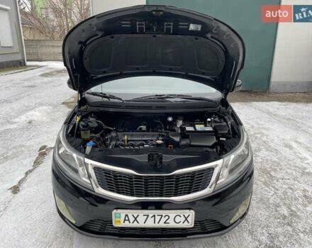 Черный Киа Рио, объемом двигателя 1.4 л и пробегом 124 тыс. км за 9350 $, фото 135 на Automoto.ua