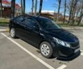 Чорний Кіа Ріо, об'ємом двигуна 1.4 л та пробігом 139 тис. км за 9500 $, фото 1 на Automoto.ua